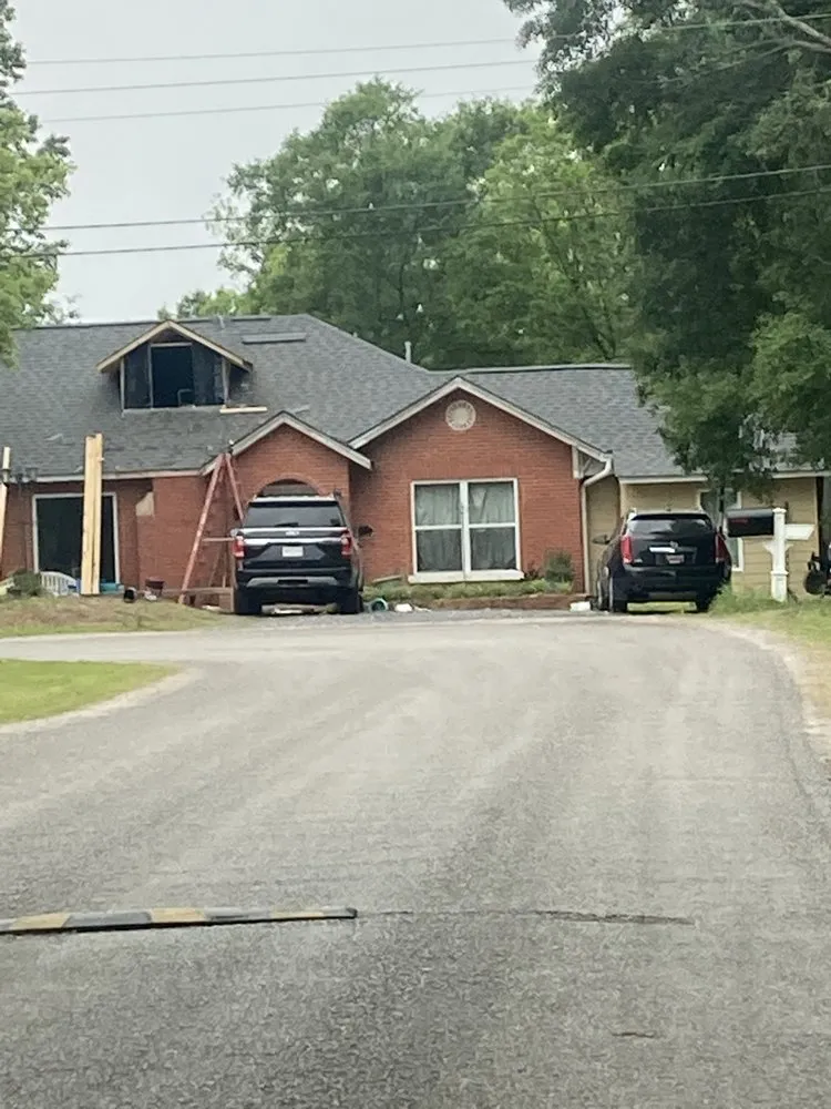 Local storm damage roof repair same-day service in Gore Springs, MS by Affordable Construction