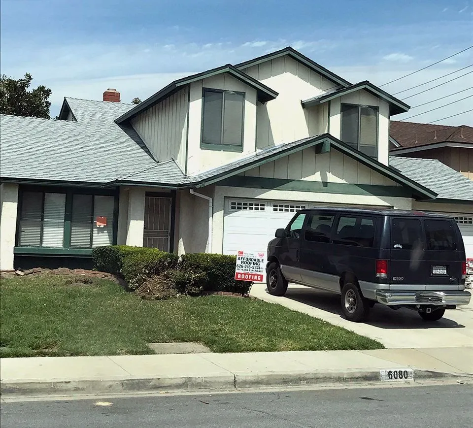 Slide of Affordable Roofing and Rain Gutters