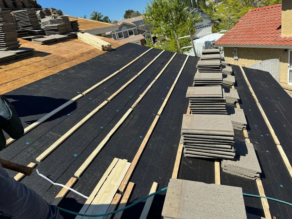 Slide of A.G.A Roofing