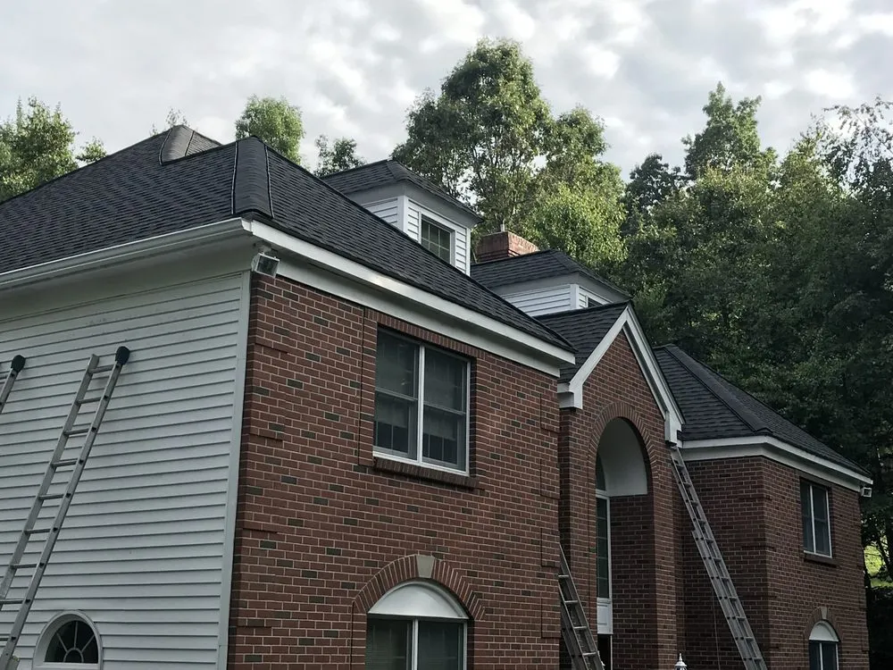 Slide of Agelis Roofing