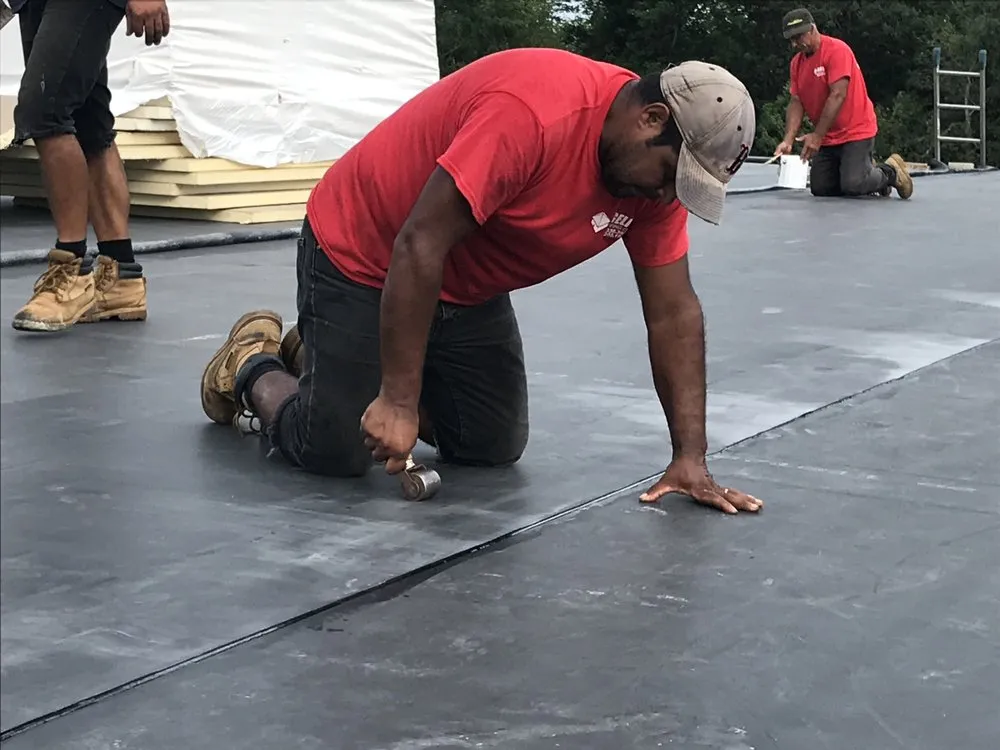 Slide of Agelis Roofing