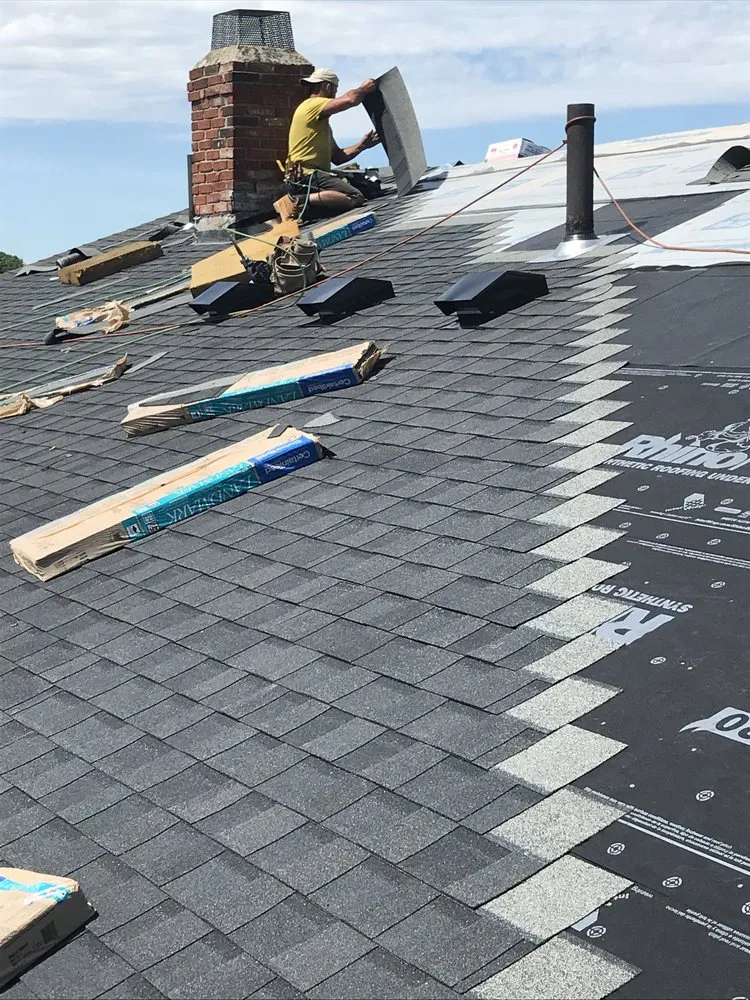 Slide of Agelis Roofing