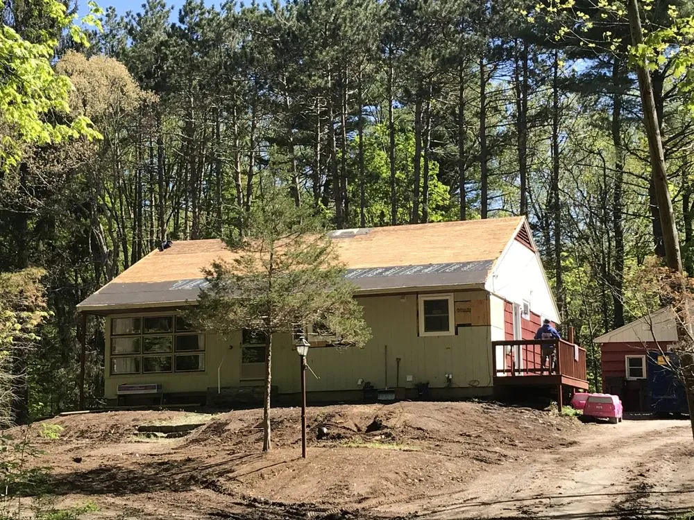 Slide of Agelis Roofing