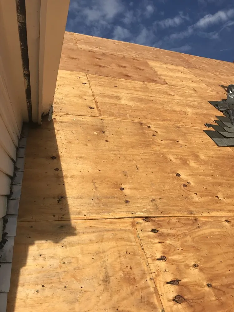 Slide of Agelis Roofing