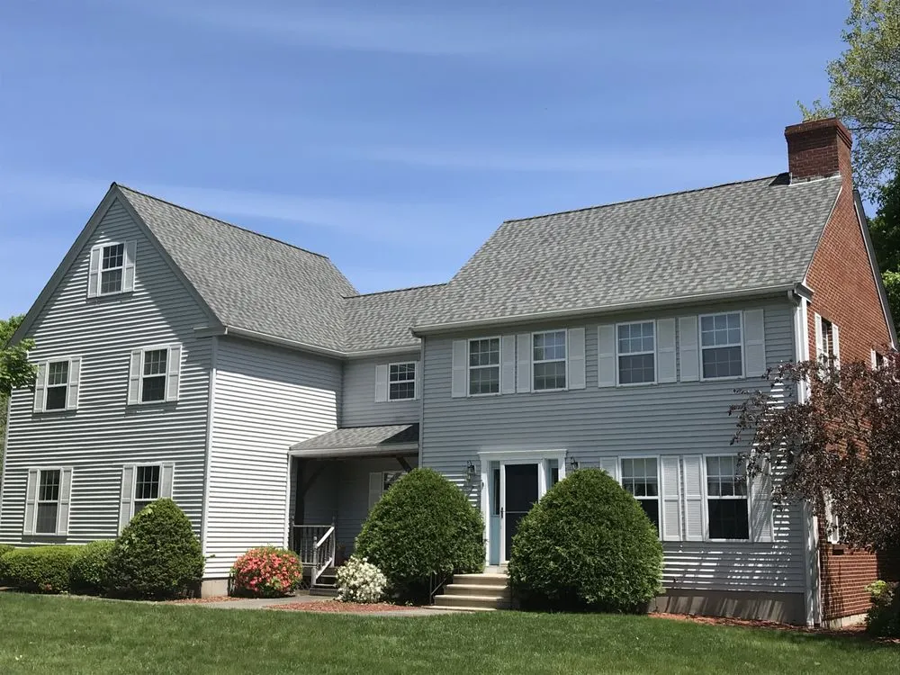 Slide of Agelis Roofing