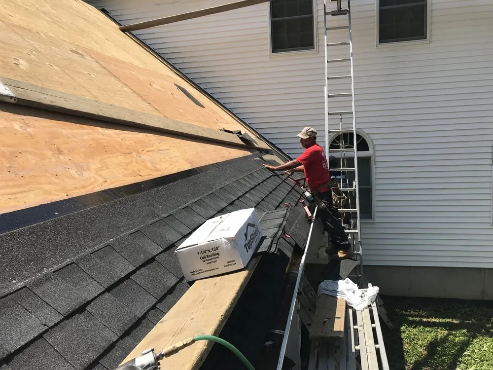 Slide of Agelis Roofing