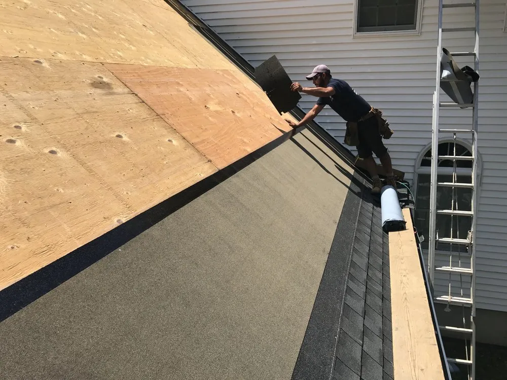 Slide of Agelis Roofing