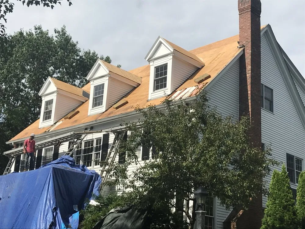 Slide of Agelis Roofing