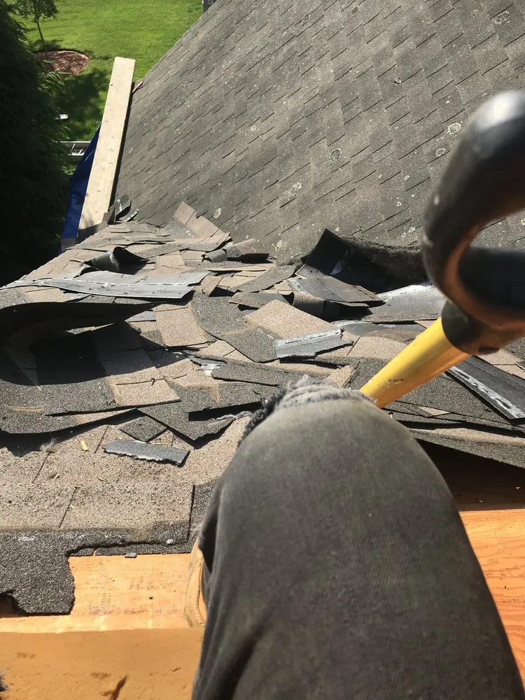 Slide of Agelis Roofing