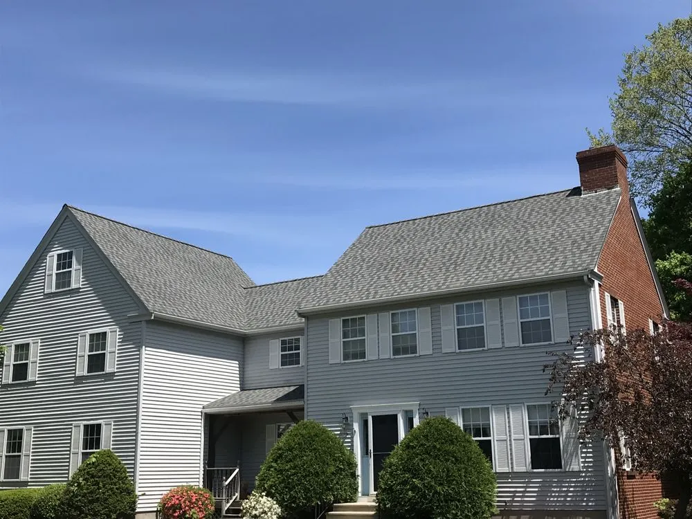 Slide of Agelis Roofing