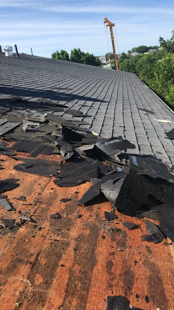 Slide of Agelis Roofing