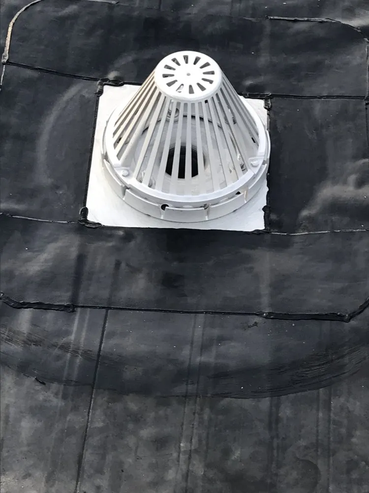 Slide of Agelis Roofing