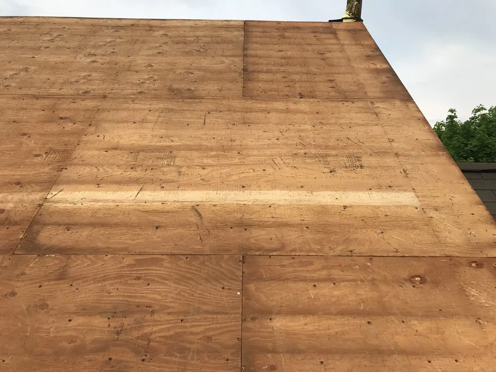 Slide of Agelis Roofing