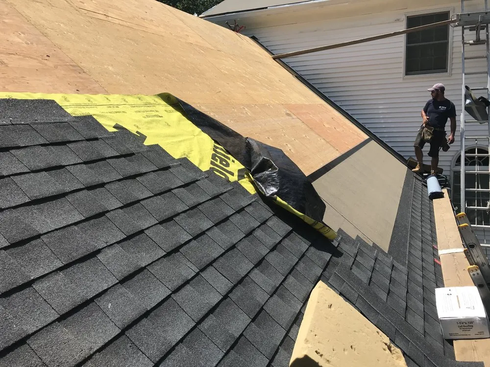 Slide of Agelis Roofing