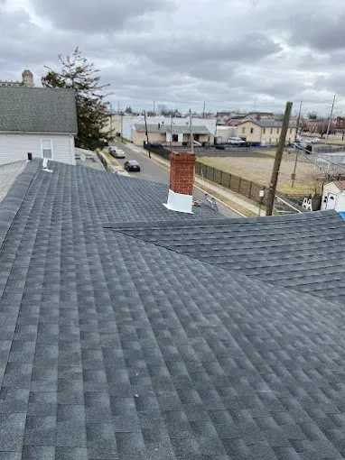 Slide of AGM Roofing