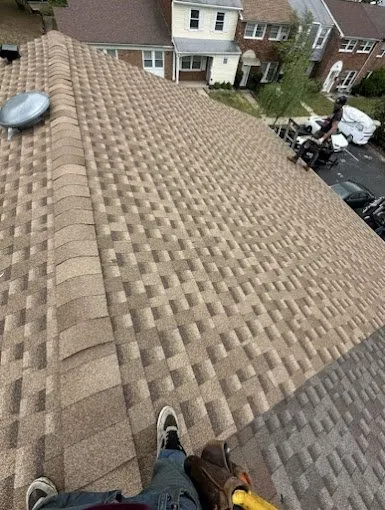 Slide of AGM Roofing