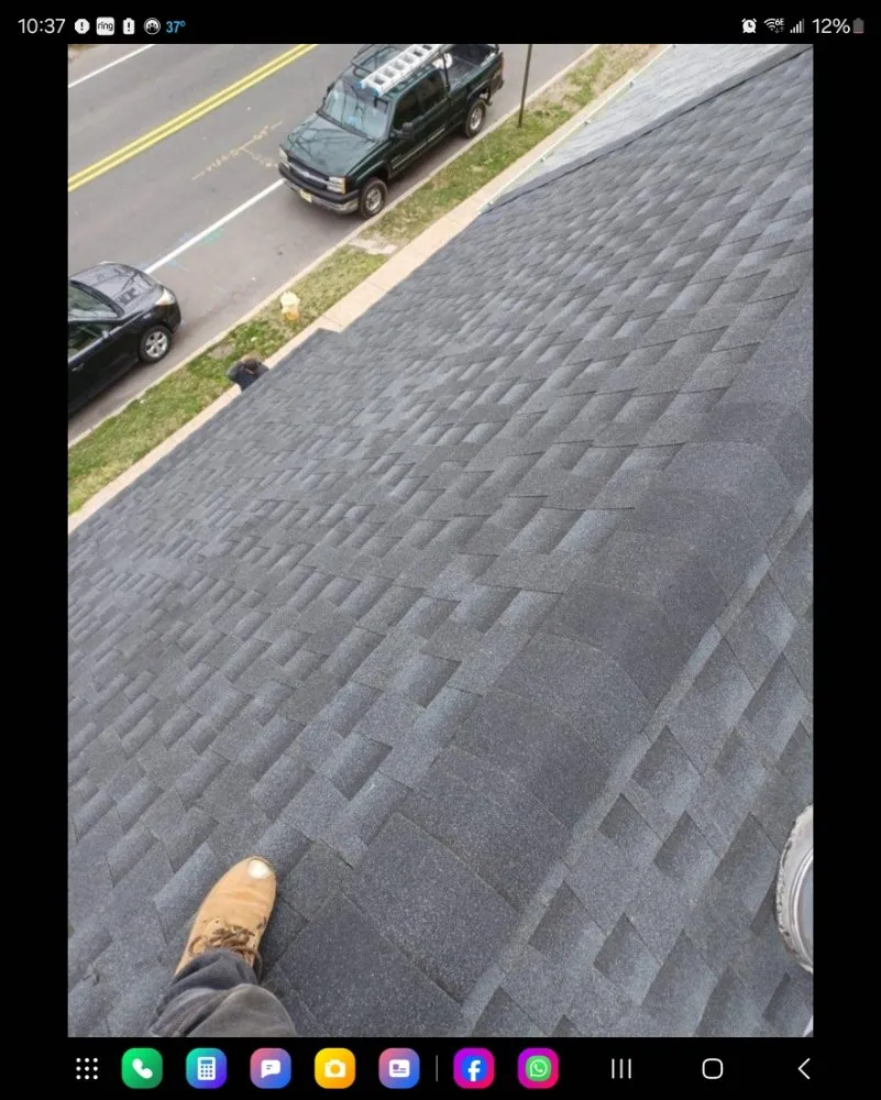 Slide of AGM Roofing