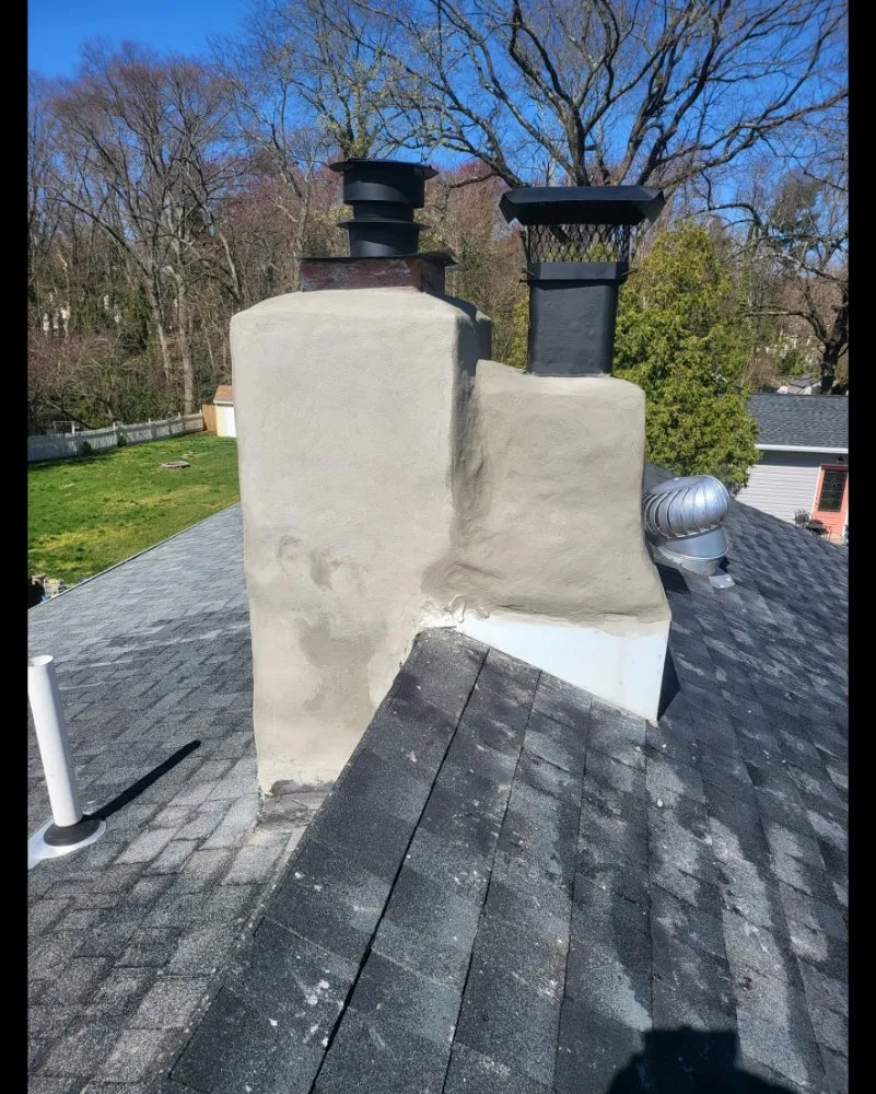 Slide of AGM Roofing