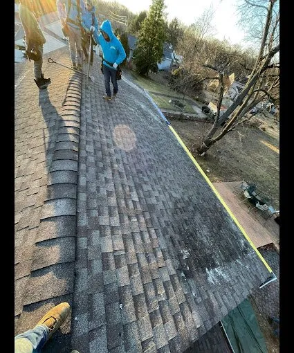 Slide of AGM Roofing