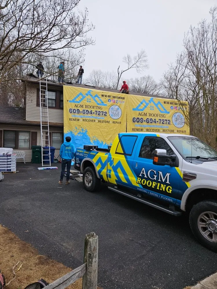 Slide of AGM Roofing