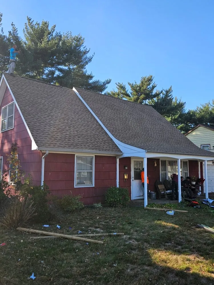 Slide of AGM Roofing