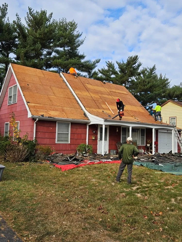 Slide of AGM Roofing