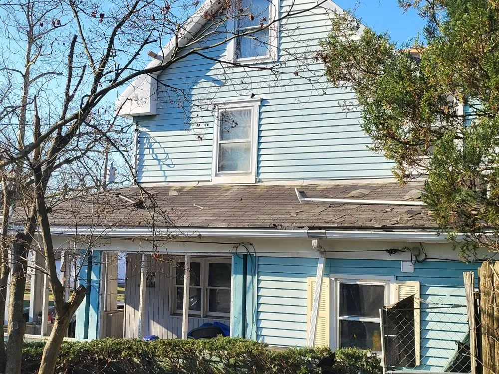 Slide of AGM Roofing