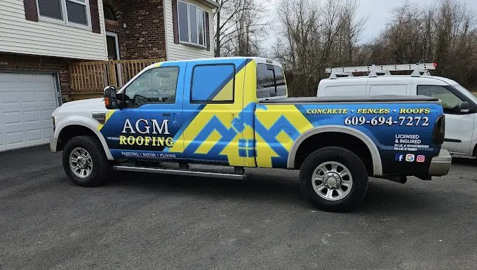 Slide of AGM Roofing