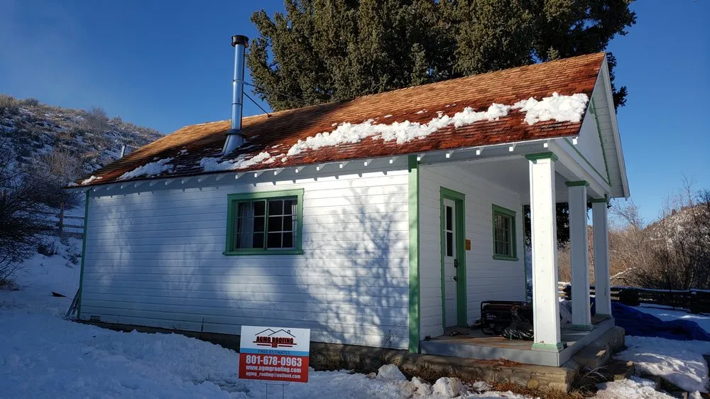 Slide of AGMG Roofing