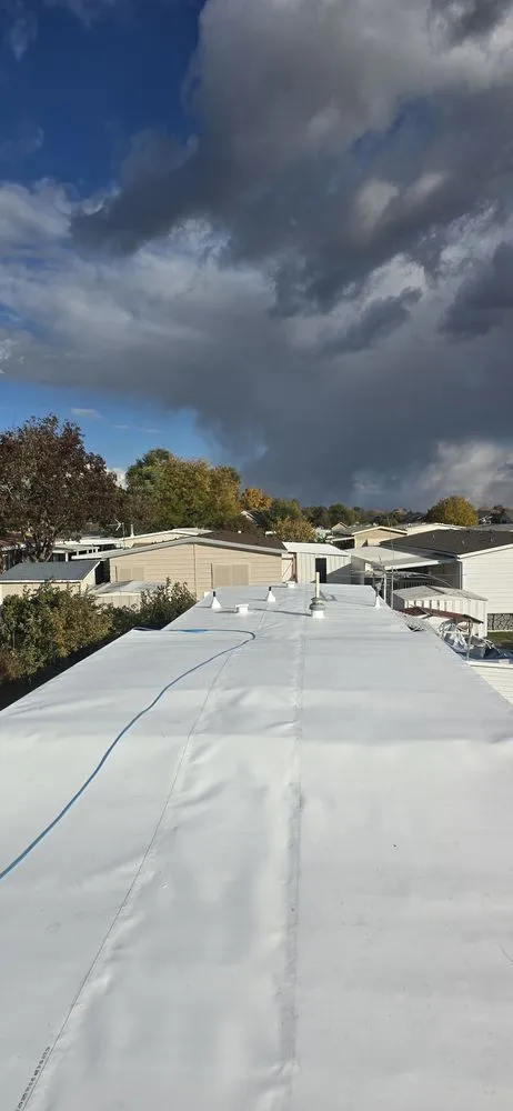 Slide of Aguila Roofing & Construction