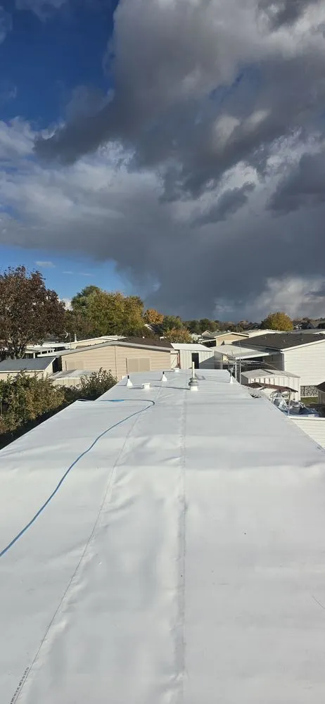 Slide of Aguila Roofing & Construction