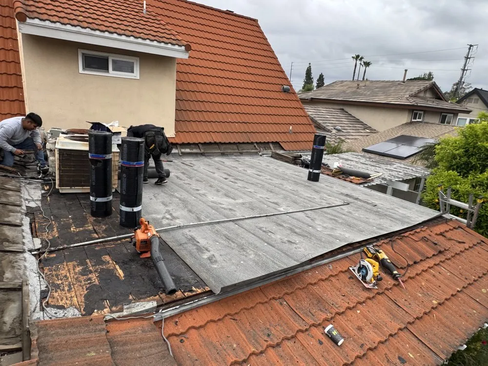 Slide of Aguilar Roofin Repair