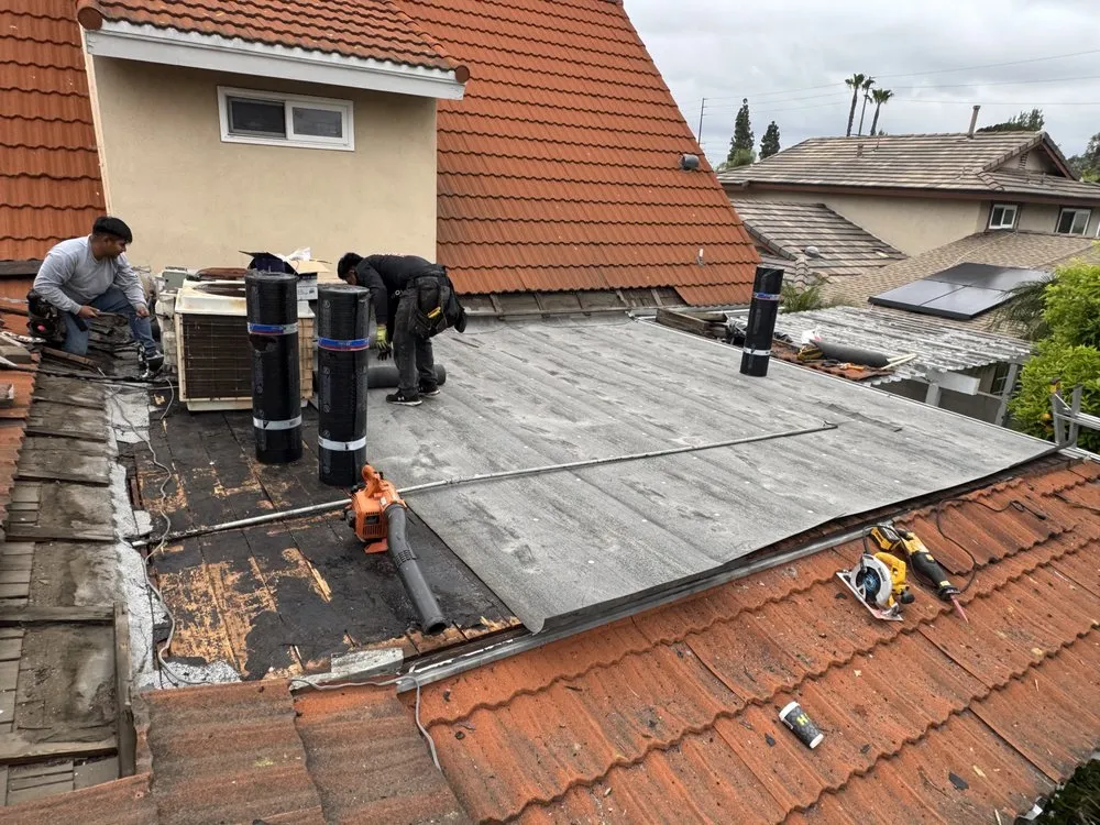 Slide of Aguilar Roofin Repair