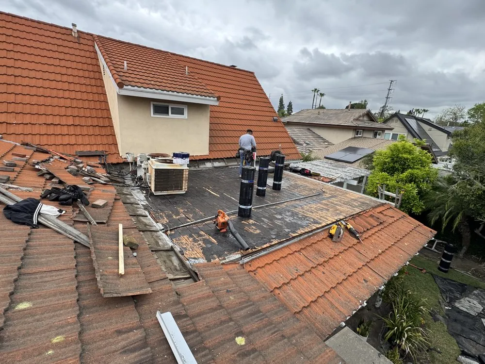 Slide of Aguilar Roofin Repair