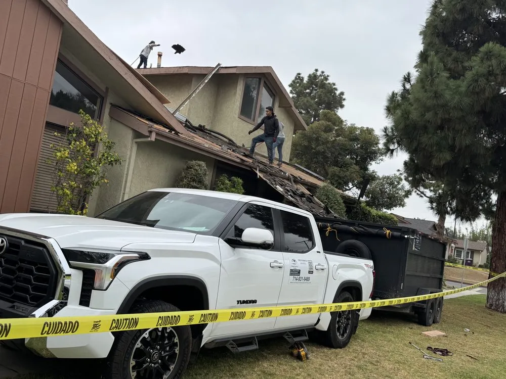 Slide of Aguilar Roofin Repair