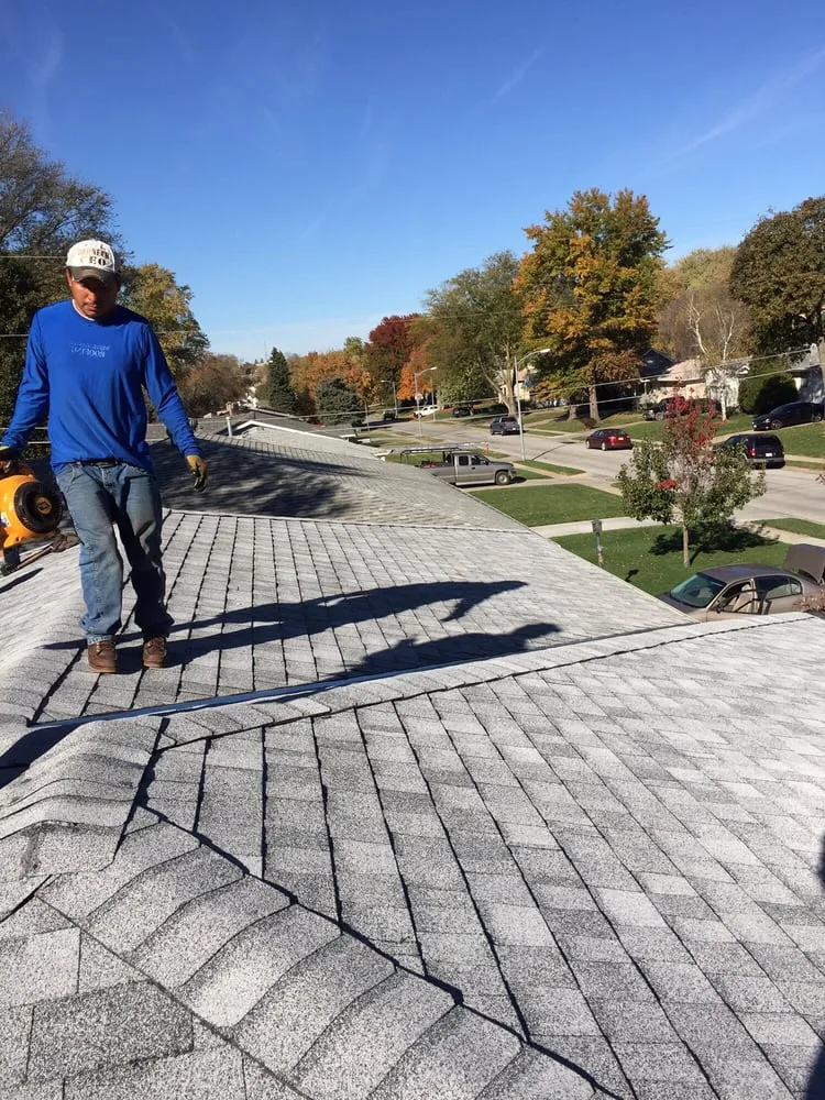 Slide of Aguilar Roofing