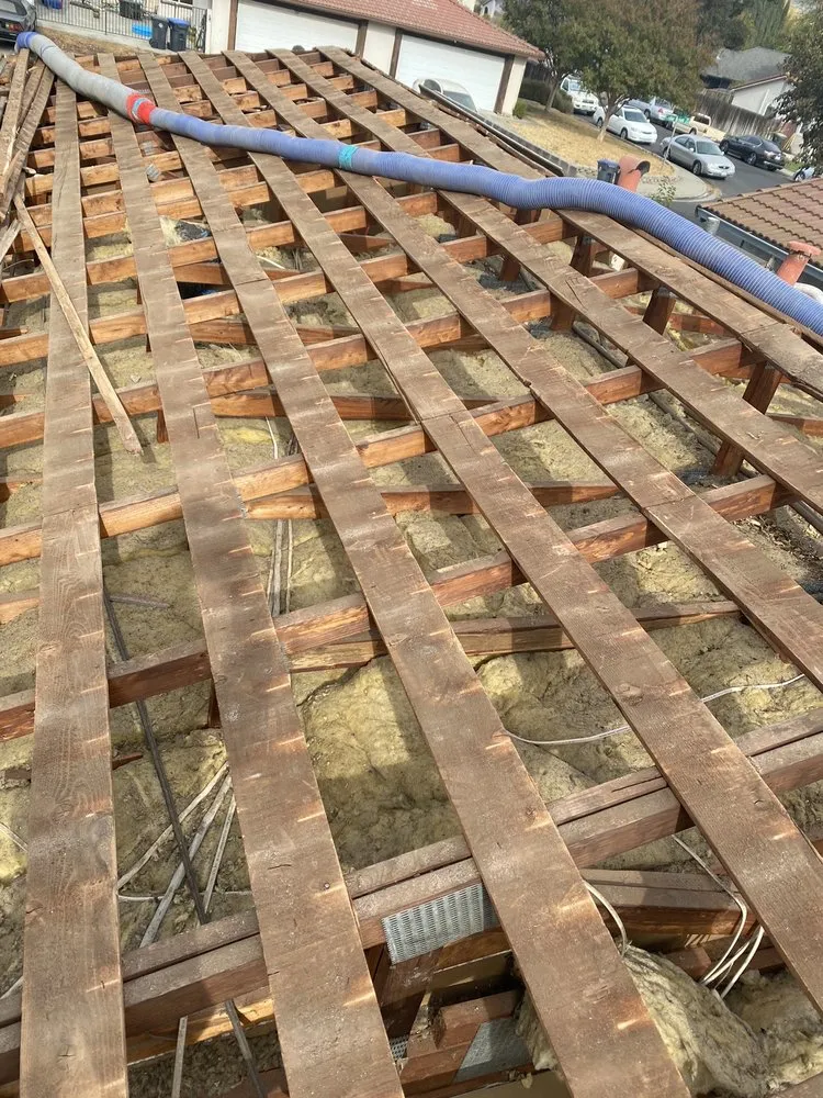 Slide of Aguilar Roofing