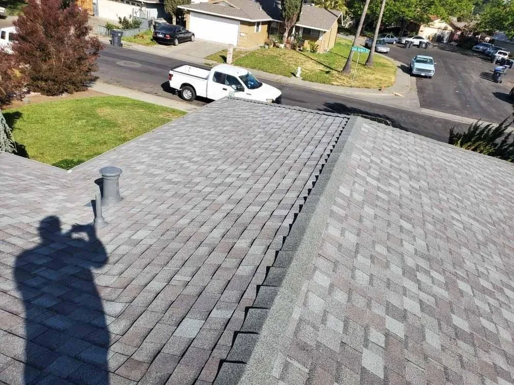 Slide of Aguilar Roofing