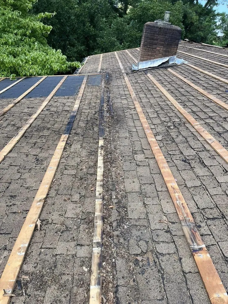 Slide of Aguilar Roofing