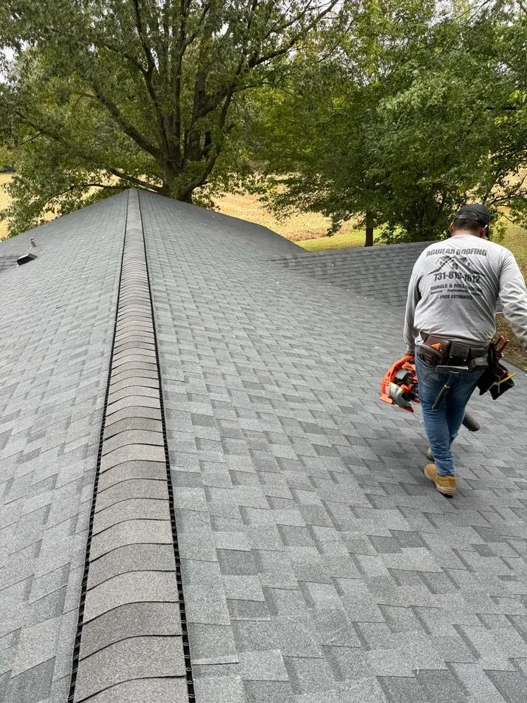 Slide of Aguilar Roofing