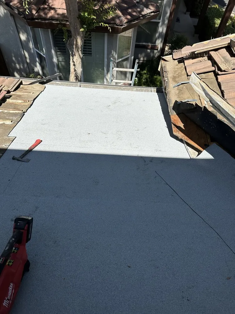 Slide of Aguilar Roofing