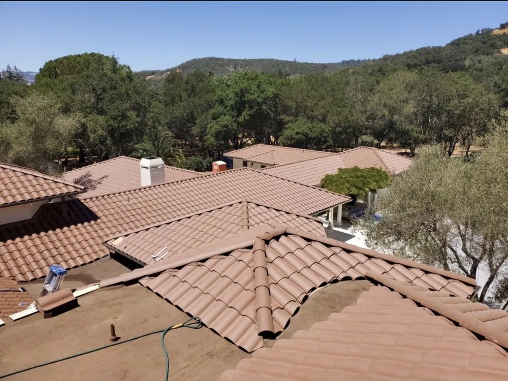 Slide of Aguilar Roofing