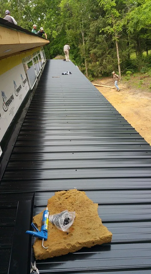 Slide of Aguilars Roofing