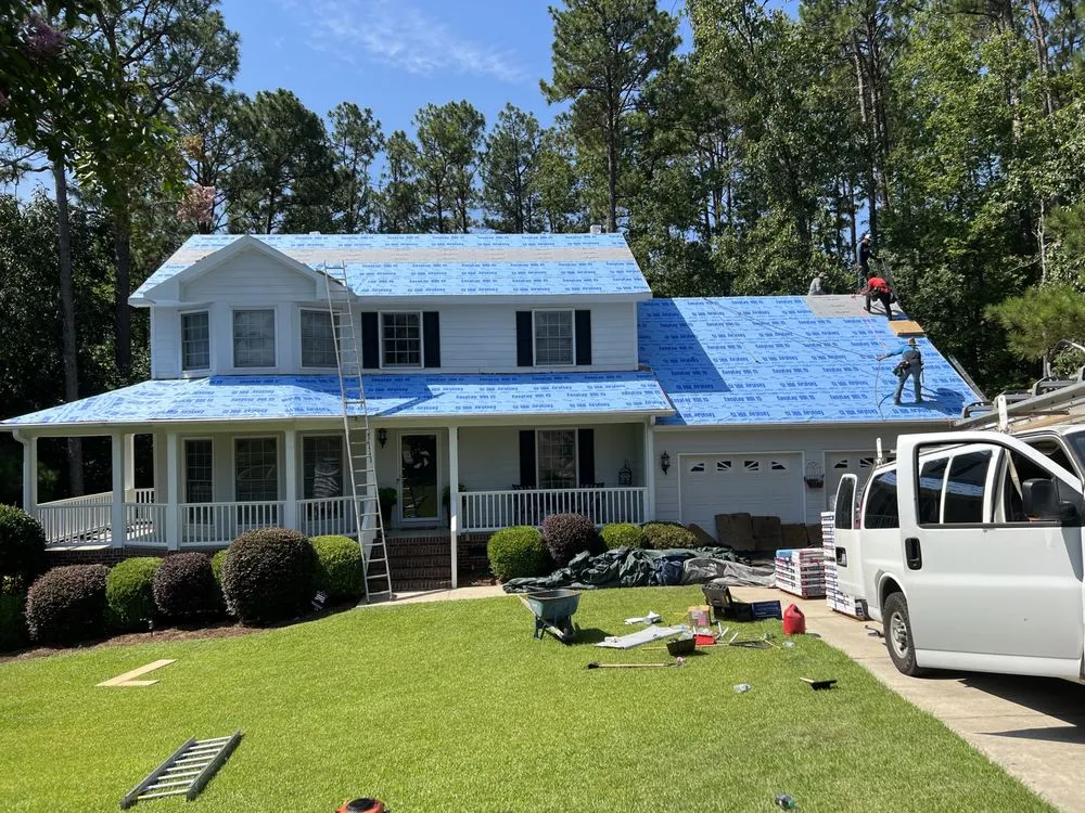 Slide of Aguillon Roofing