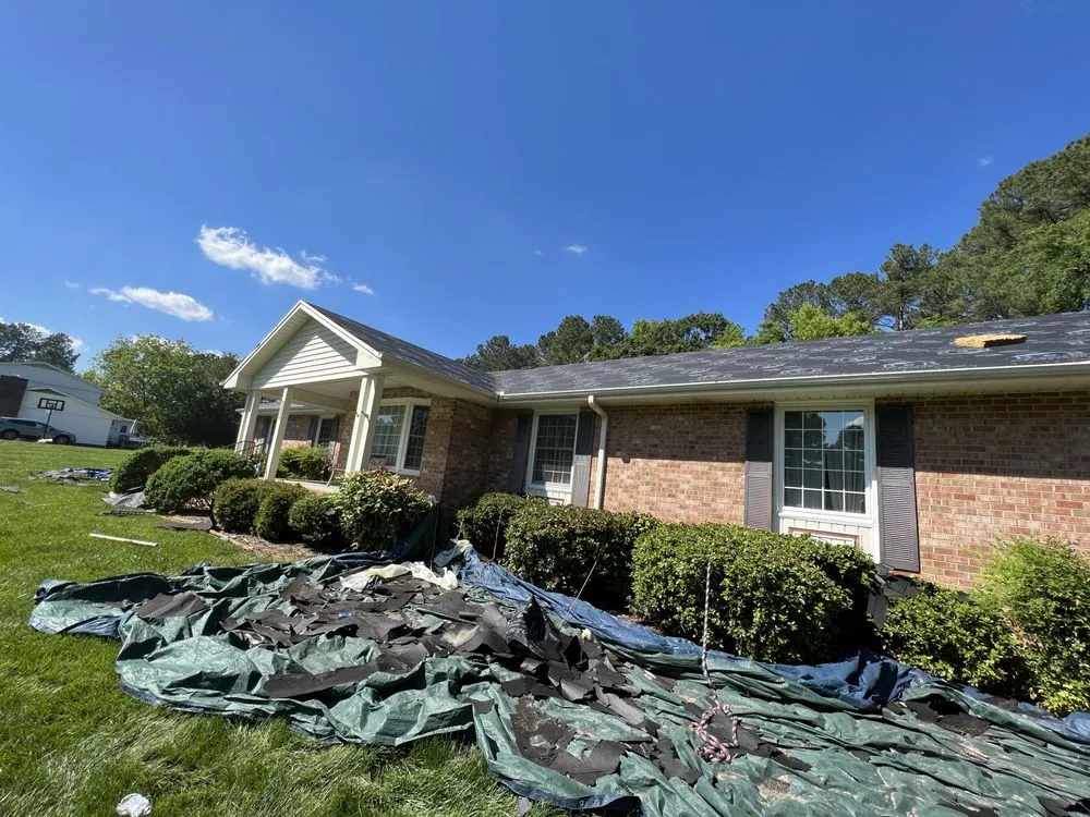 Slide of Aguillon Roofing