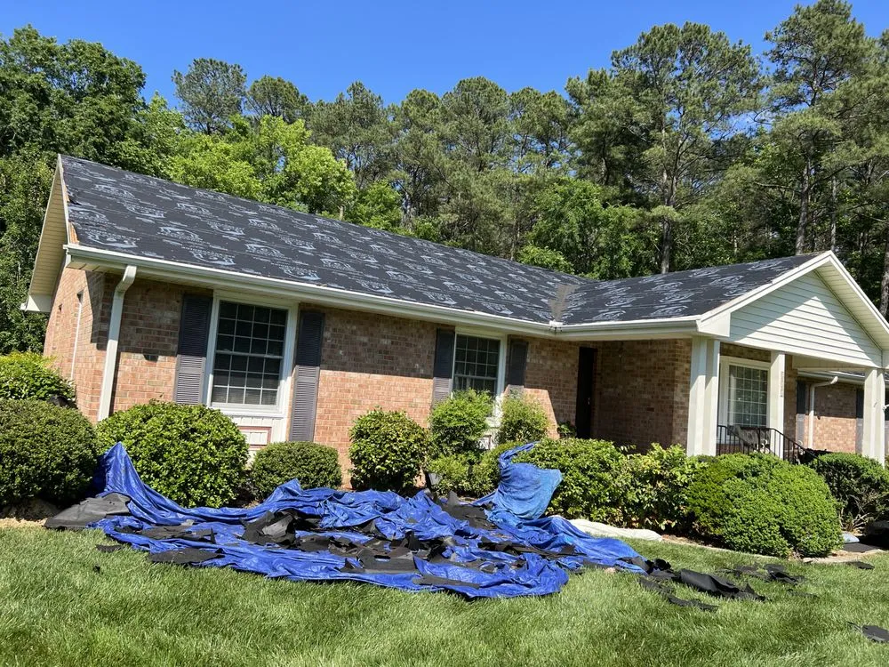 Slide of Aguillon Roofing