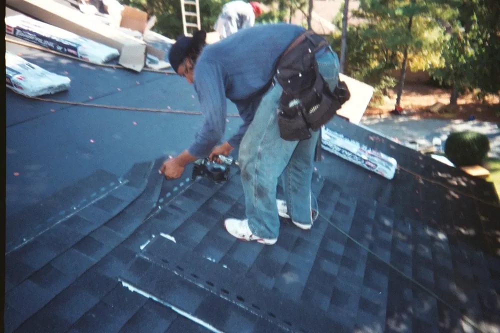 Slide of Aguillon Roofing