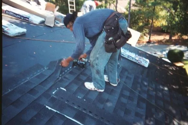 Slide of Aguillon Roofing