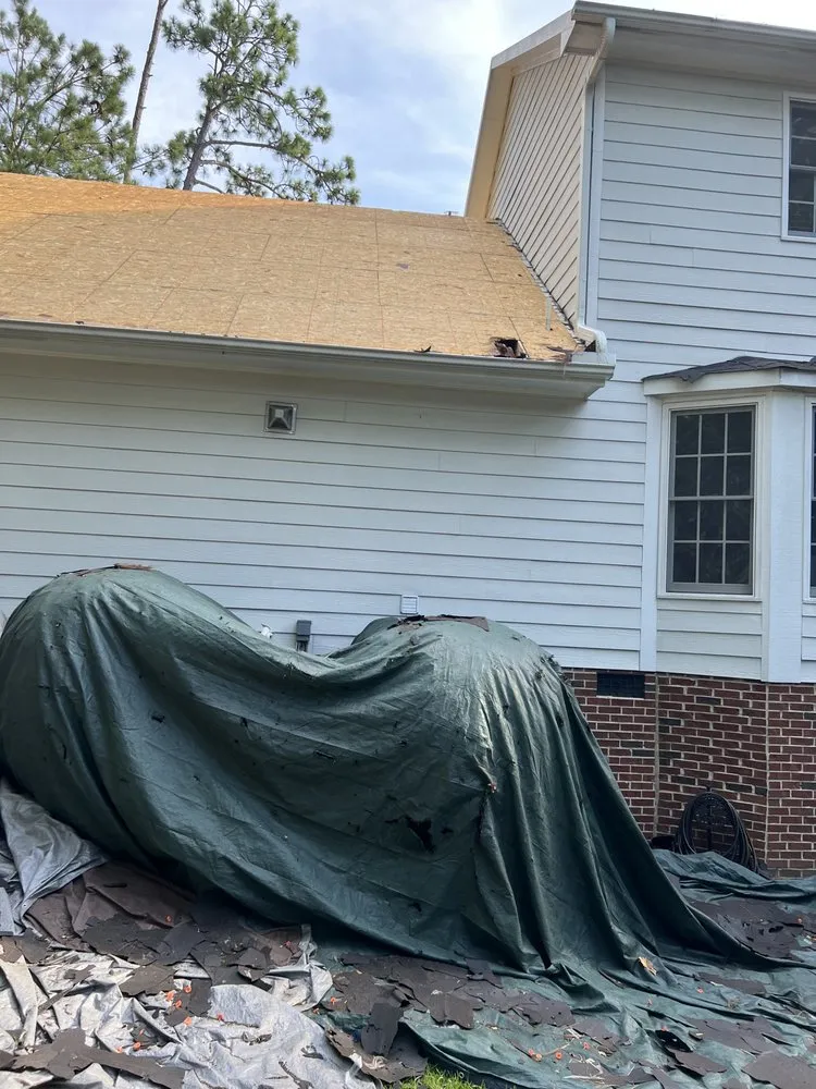 Slide of Aguillon Roofing