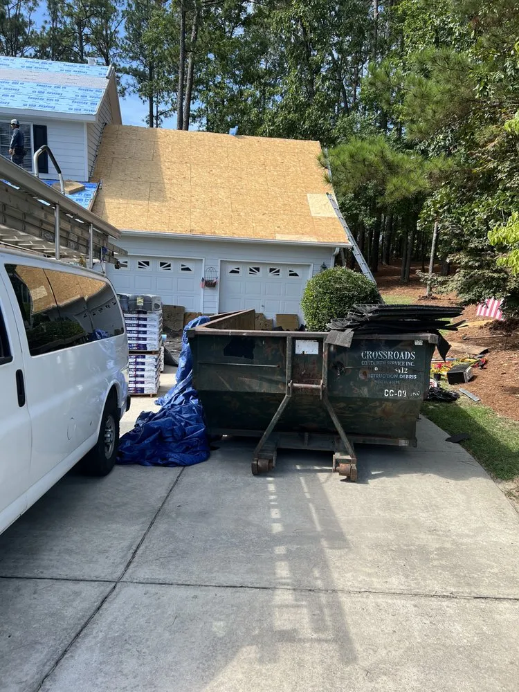 Slide of Aguillon Roofing